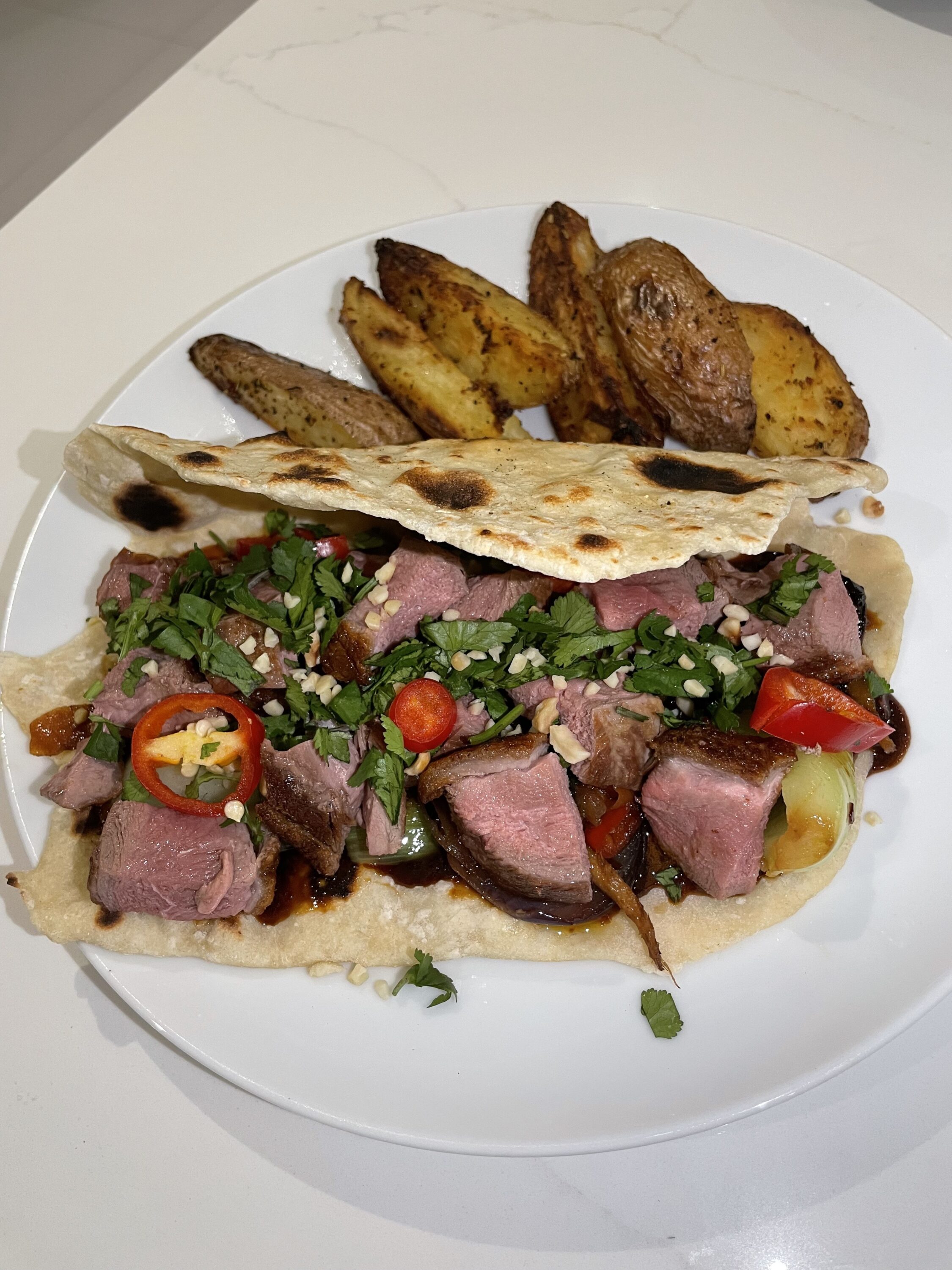 Pan fried duck Asian flatbreads