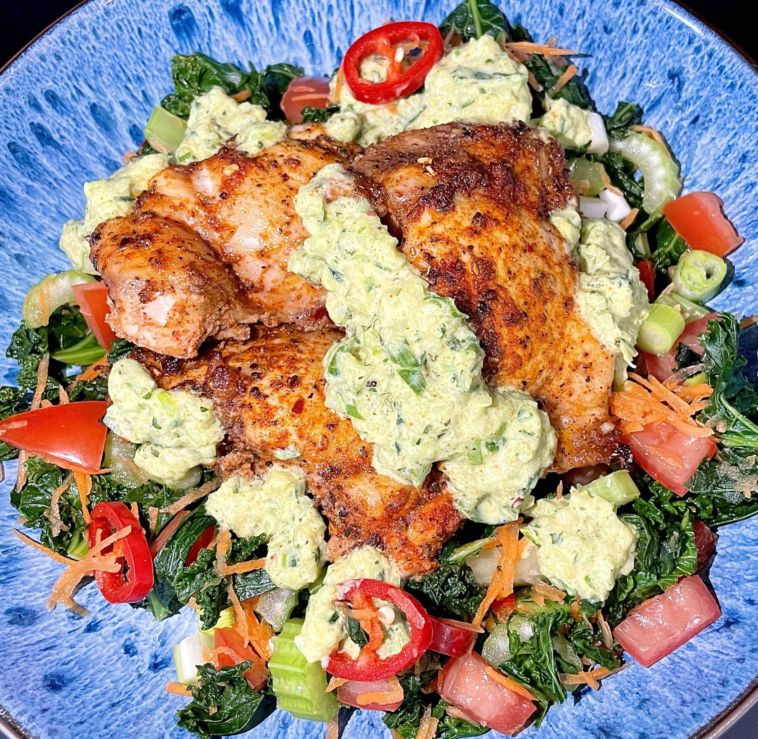 Next level chicken and kale salad with curry spiced yogurt dip